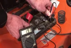 Connect the Digital Multimeter to the Battery.