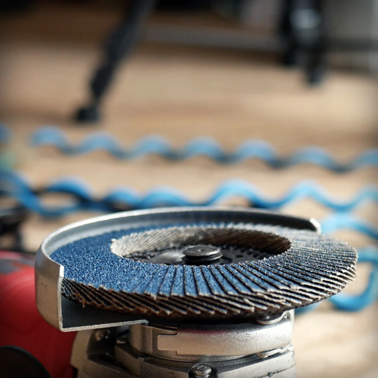 grit flap disc for sharpening mower blades
