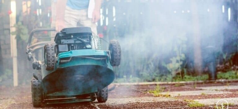 why is my push mower smoking white